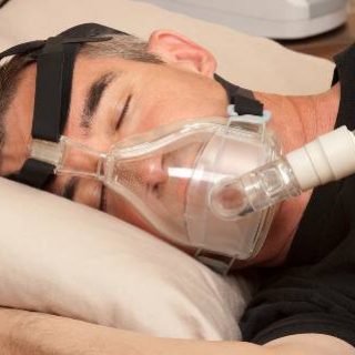 Patient using BiPAP machine