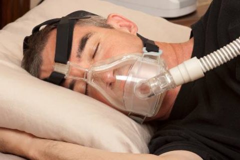 Patient using BiPAP machine