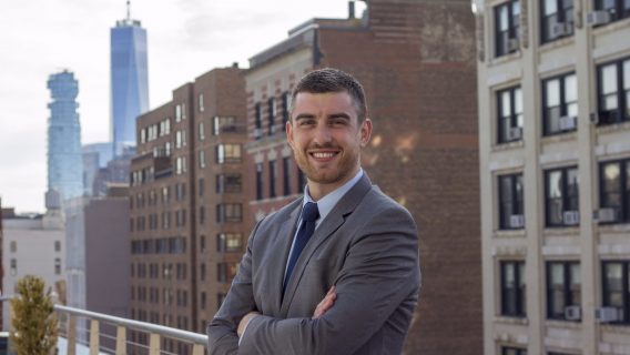 man in a suit in a city