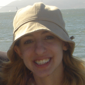 A photo of Christy Bieber, Writer at DrugWatch.com, smiling and wearing a hat.