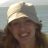 A photo of Christy Bieber, Writer at DrugWatch.com, smiling and wearing a hat.