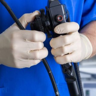 Doctor with endoscope