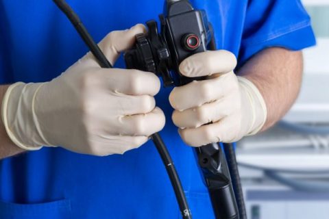 Doctor with endoscope