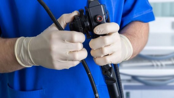 Doctor with endoscope