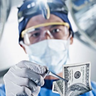 Hernia mesh surgeon holding money