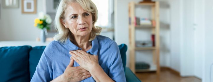 Woman with pain in her chest