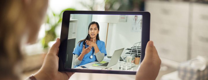 Patient using tablet for telemedicine visit
