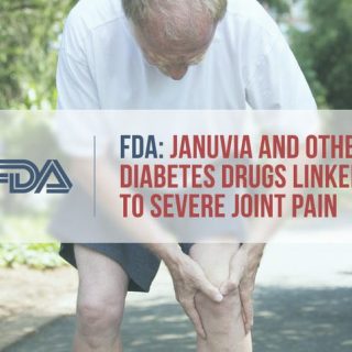 Man outside holding his knee in pain