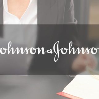 Woman at table with legal textbook