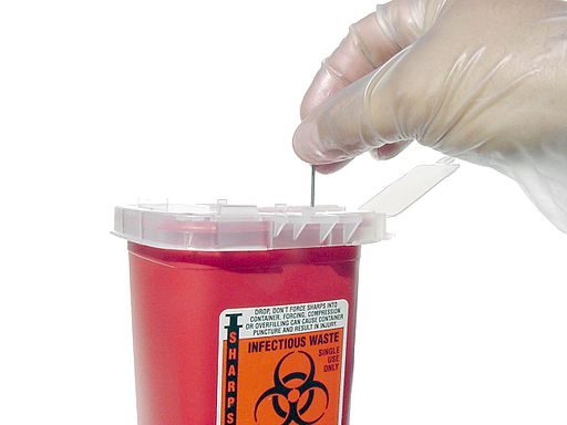 Sharps waste container