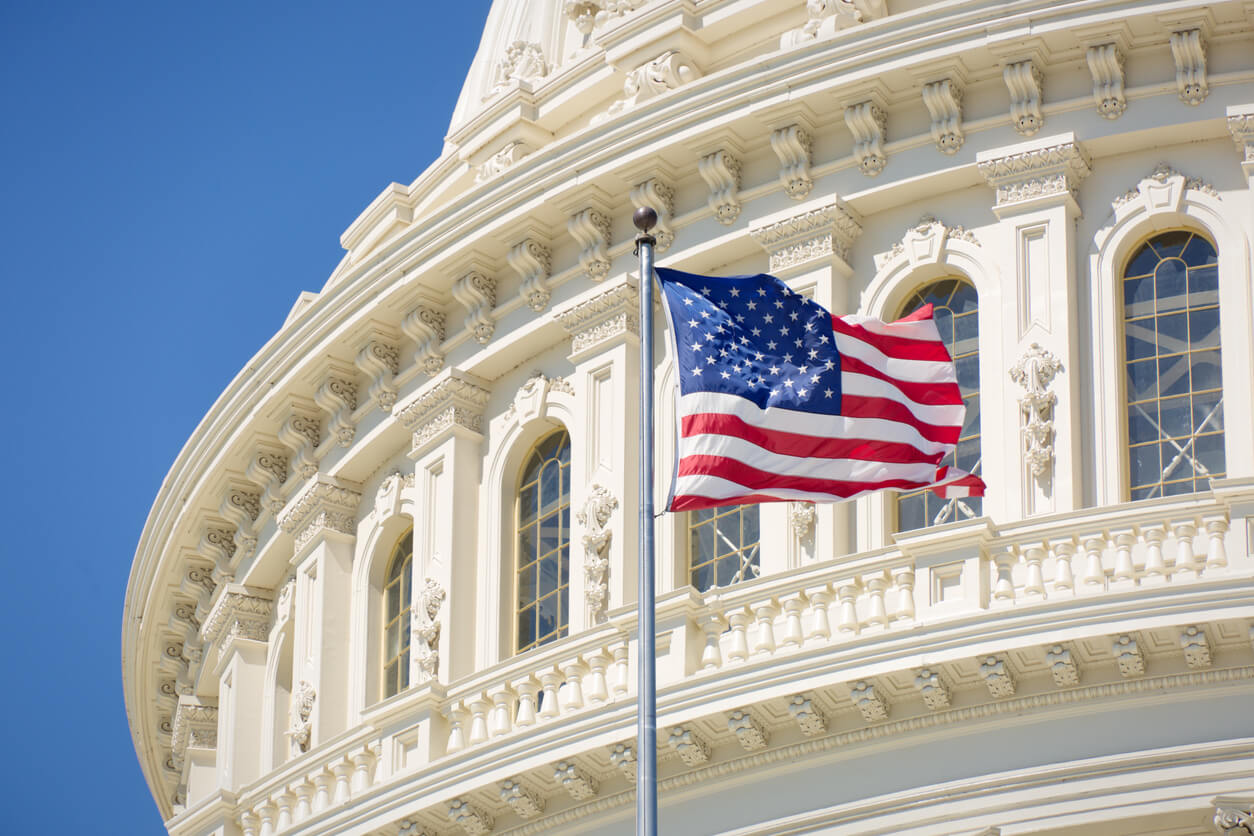 U.S. Capitol exterior with flag