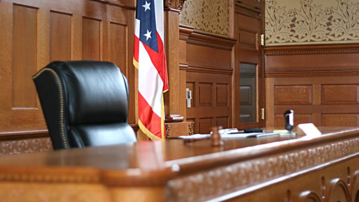 U.S. courtroom with flag
