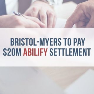 businessmen signing a document