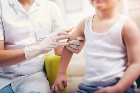 Child receiving vaccination