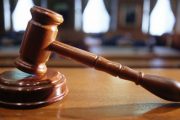closeup of a gavel in a courtroom