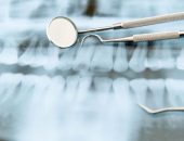 Dental tools on X-ray of teeth
