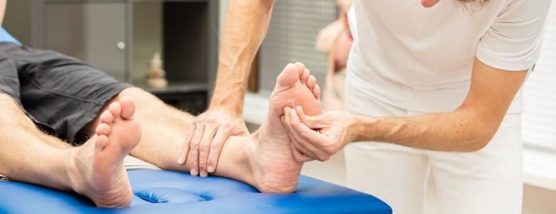 Prick test on a patient's foot