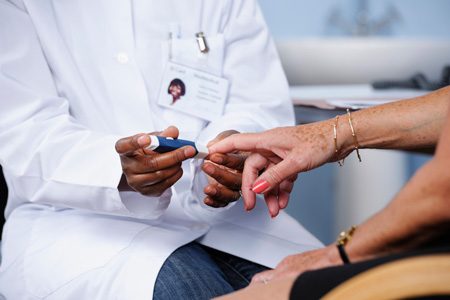 Older Woman's Blood Sugar Being Tested