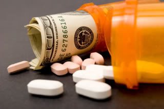 Prescription bottles holding pills and money