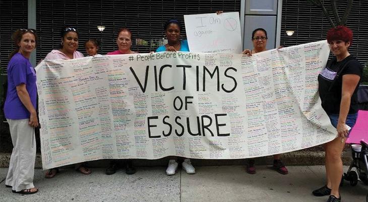 Essure victims hold sign