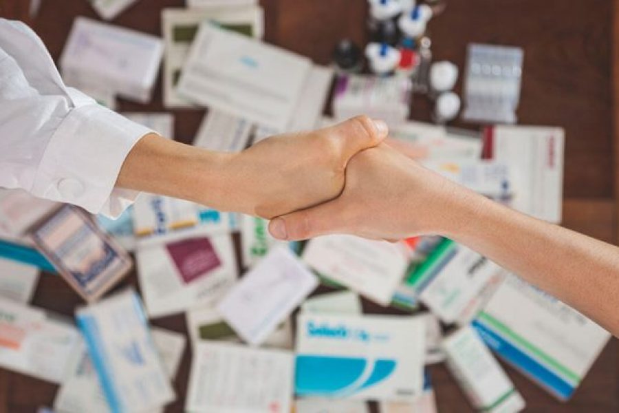Shaking Hands over Prescription Drugs