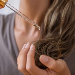 Hair product drops put in hair