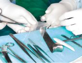 Hernia Mesh Being Handled by Surgeons