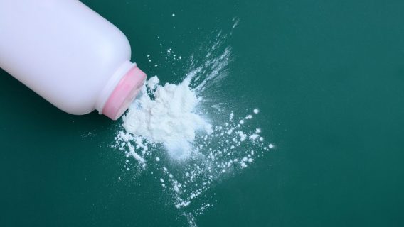 Talcum powder spilling out of bottle