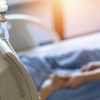 Patient using IV drip