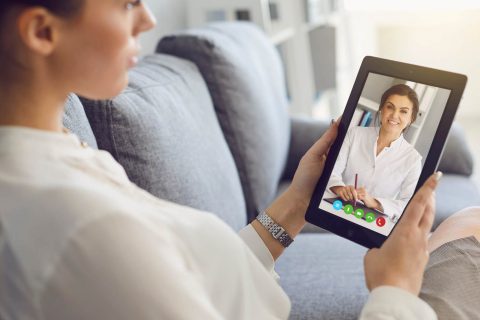 A patient using telemedicine for a doctor's appointment