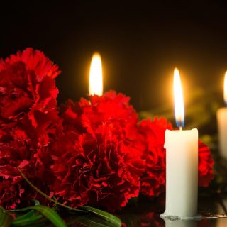 candles and red flowers