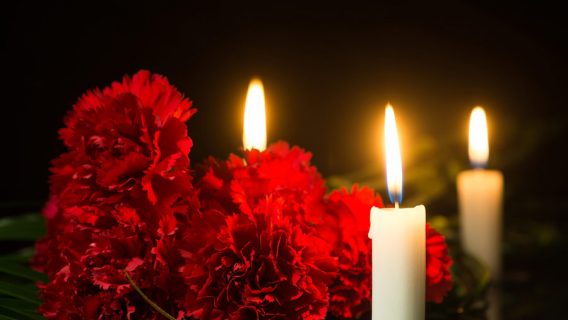 candles and red flowers