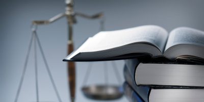 Scale of justice and law books
