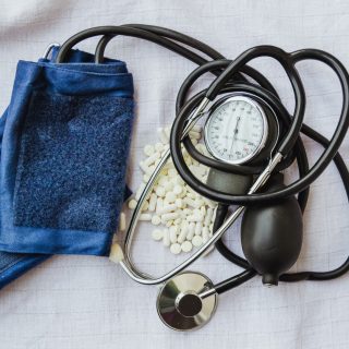 Blood pressure meter and white pills