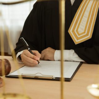 Judge signing document