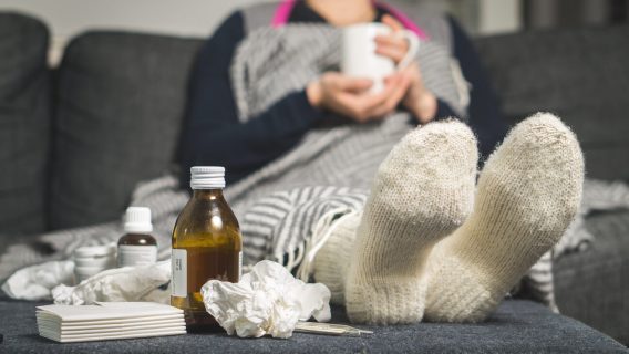 Woman on couch with pneumonia