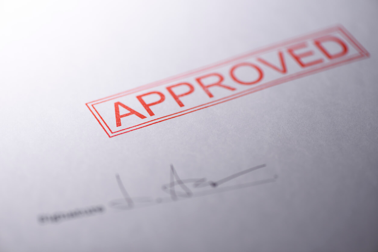 Close up of approved stamp on paper