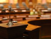 scales of justice in court room