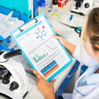 scientist checking drug results