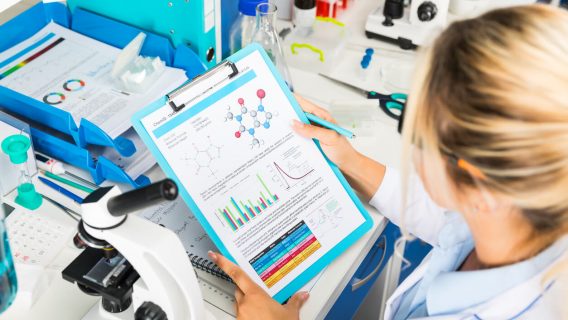scientist checking drug results