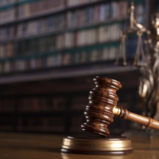 Gavel and Themis statue