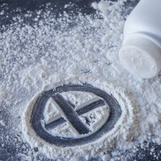 Talcum powder with cross
