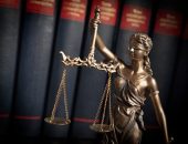 Legal scales of justice with books