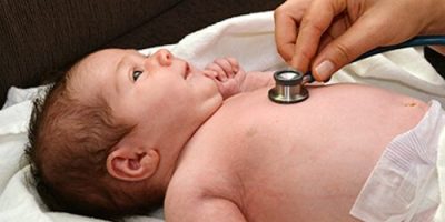 Baby with Stethoscope to Heart