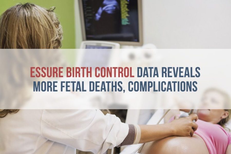 Nurse giving ultrasound to pregnant woman