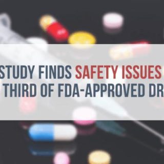 assortment of pills and a syringe scattered on a table