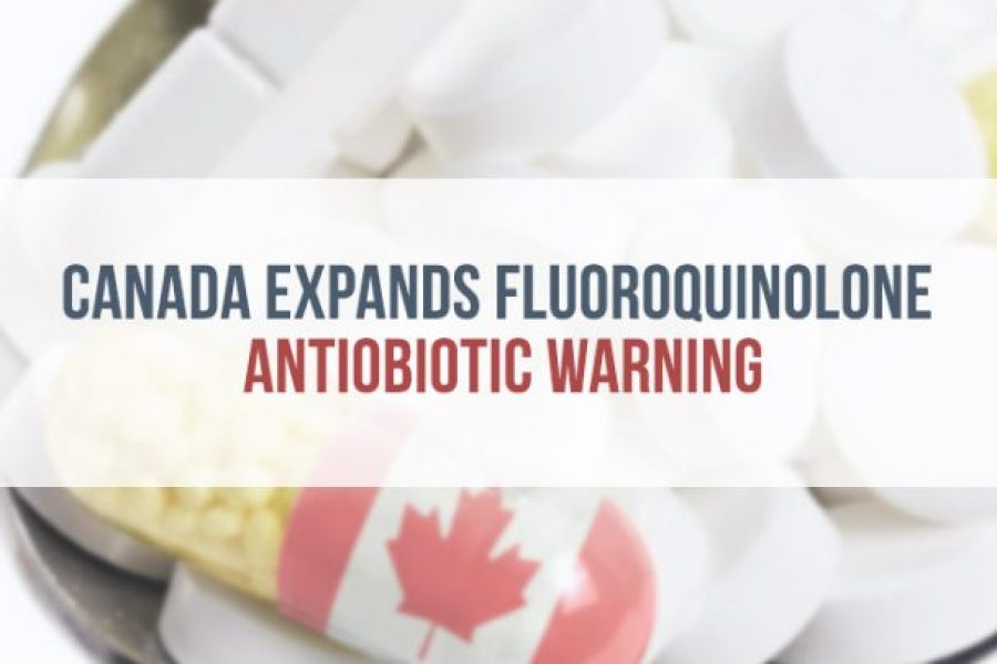 pills on a spoon, one with the Canadian flag symbol