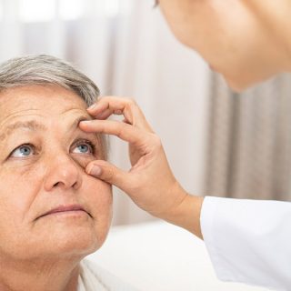 Doctor checking patient's ocular health