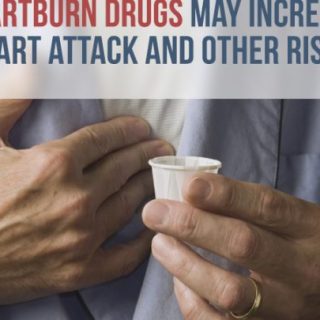 Man holding medication cup