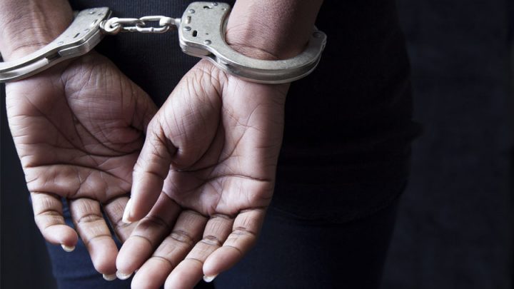 Woman in handcuffs
